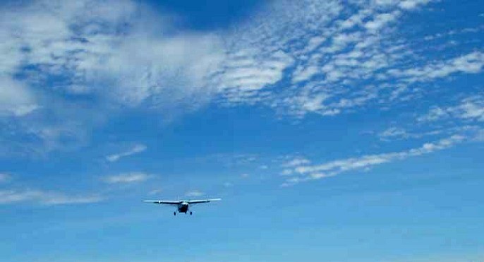 A small plane approaching Mwanza airport - air transport adventure in Mwanza